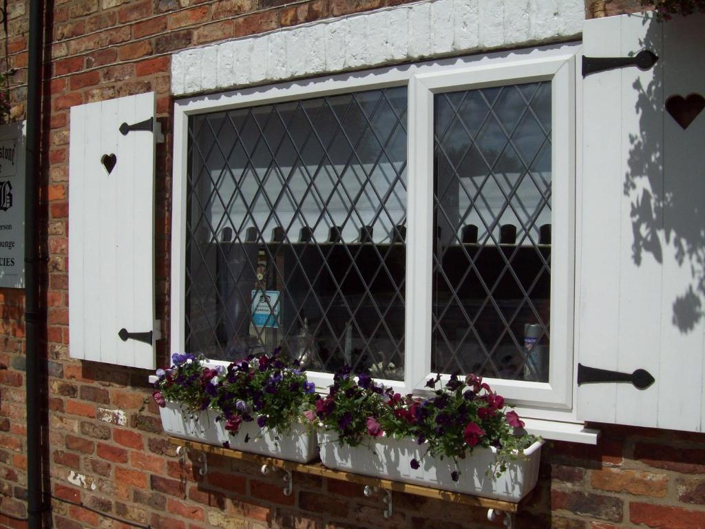 Fifth Milestone Cottage Dunnington Exterior photo